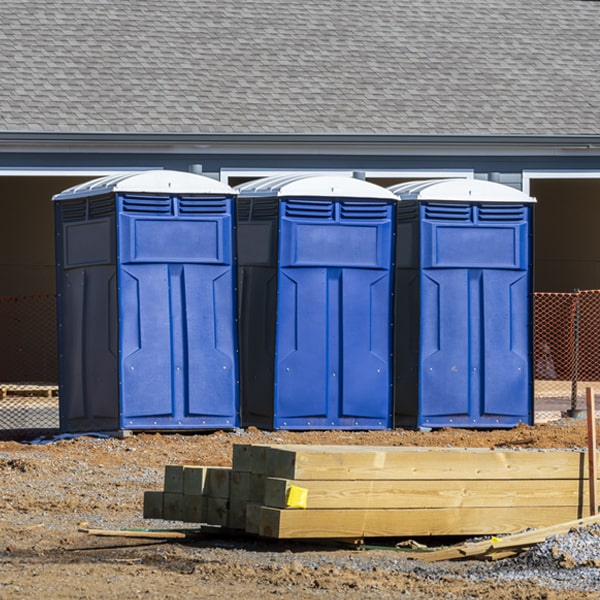 what is the cost difference between standard and deluxe portable restroom rentals in Youngsville